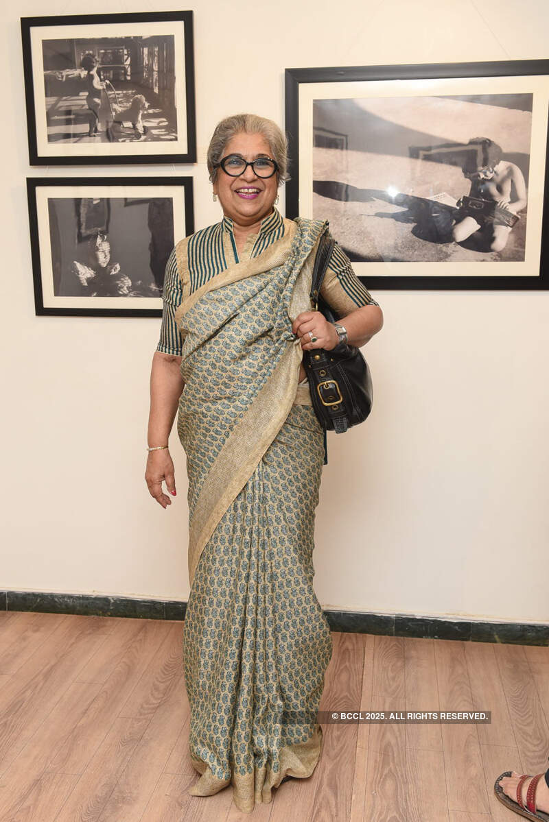 Socialites attend photo exhibition