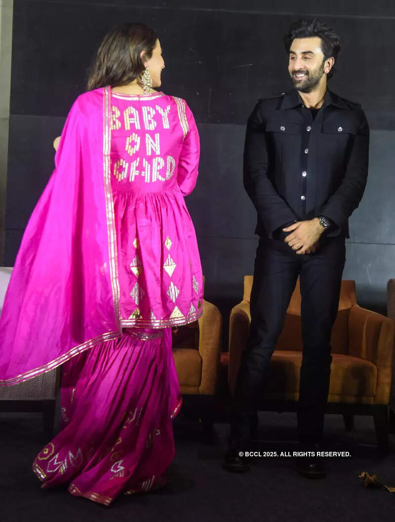 Mom-to-be Alia Bhatt flaunts her pink suit with 'baby on board' special text inscribed on it at 'Brahmastra' pre-release event