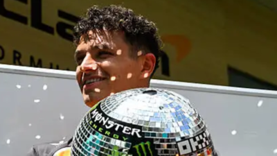 McLaren’s Lando Norris clears up confusion over controversial disco ball helmet in Miami Grand Prix after fans storm social media